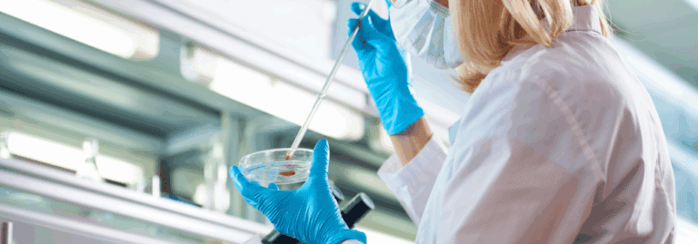 A Biomedical Scientist placed by Hunter Gatherer AHP conducting diagnostic testing in a laboratory, demonstrating the value of expert recruitment in pathology services.