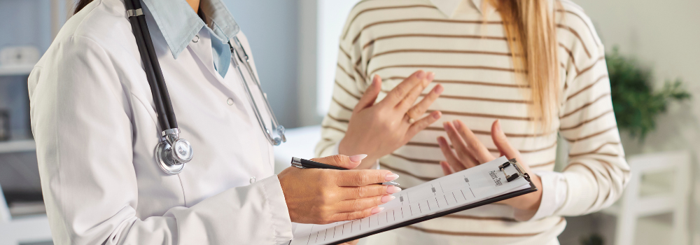 Doctor consulting with patient in a private healthcare setting, highlighting opportunities for Allied Health Professionals in the private sector