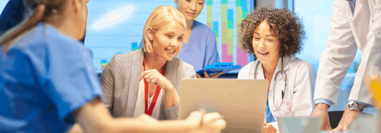 Healthcare professionals and managers discussing workforce planning in a hospital setting