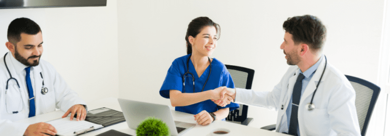 Allied Health professional discussing career progression and banding with NHS manager under Agenda for Change pay structure